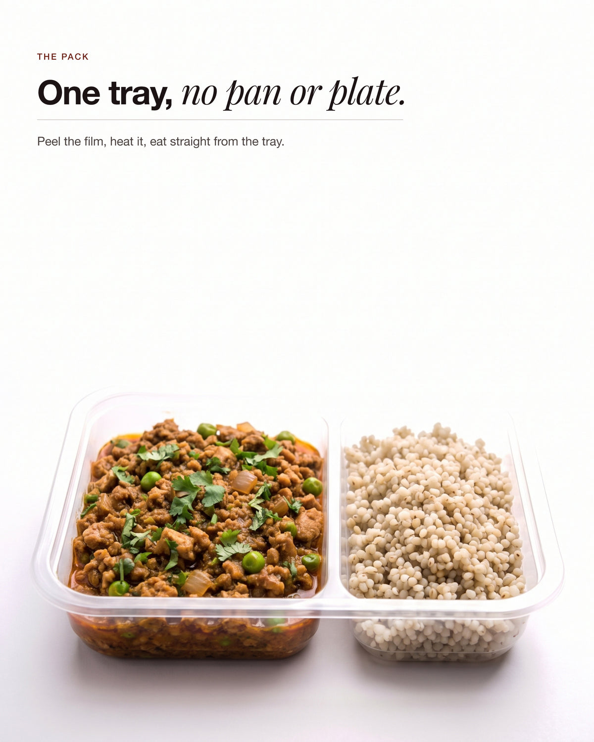 Chicken Keema Breakfast Bowl in its two-compartment tray, chicken keema beside pearl millet