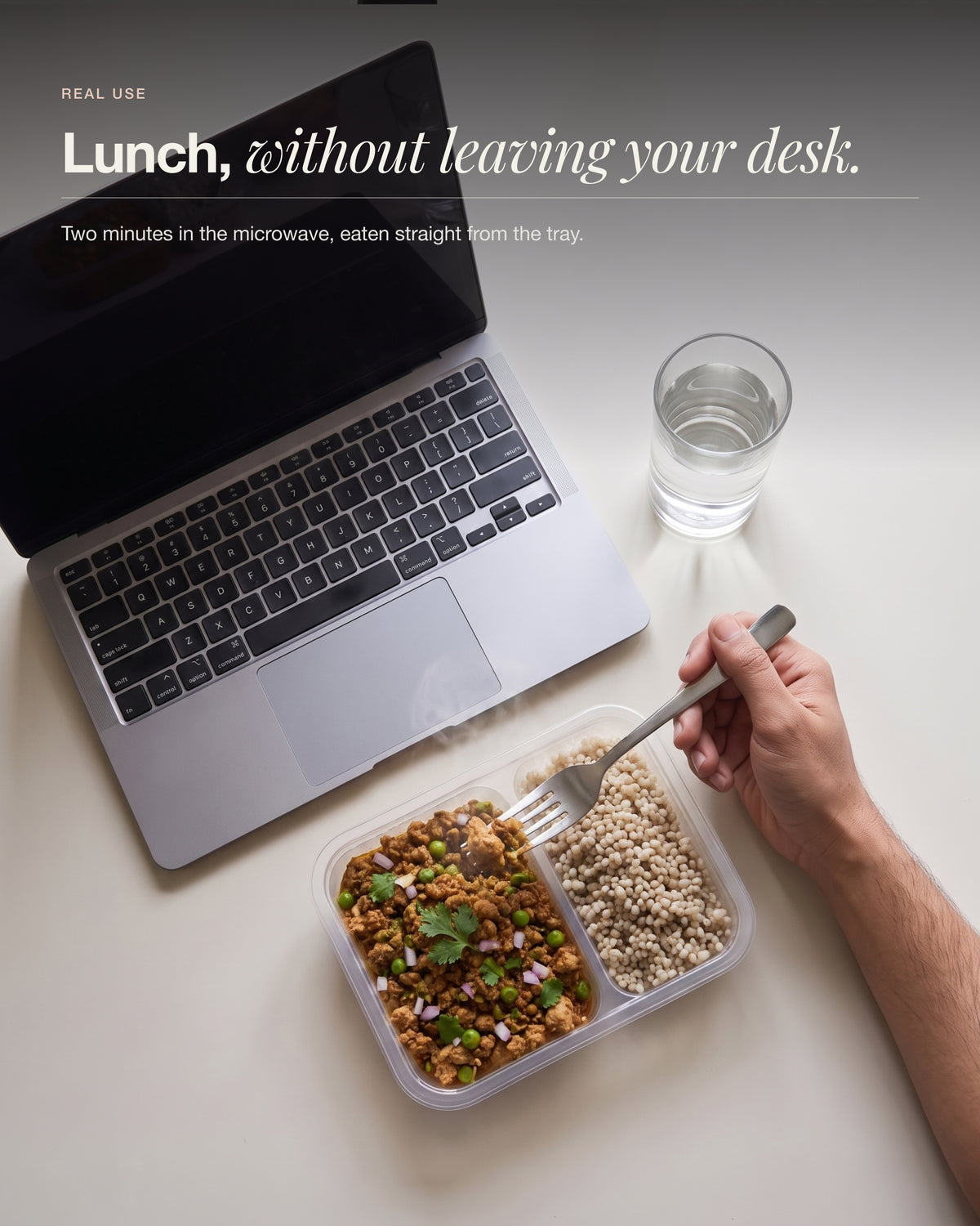 Chicken Keema Breakfast Bowl eaten at a desk beside a laptop