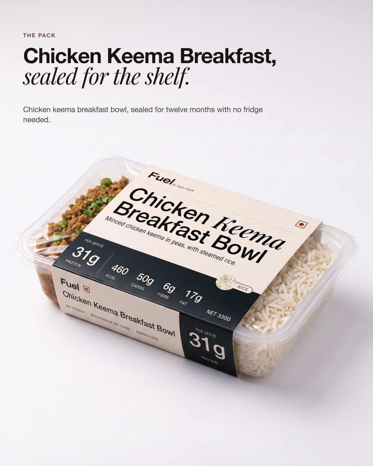 Chicken Keema Breakfast Bowl, sealed tray on white with the printed sleeve, ready for the shelf