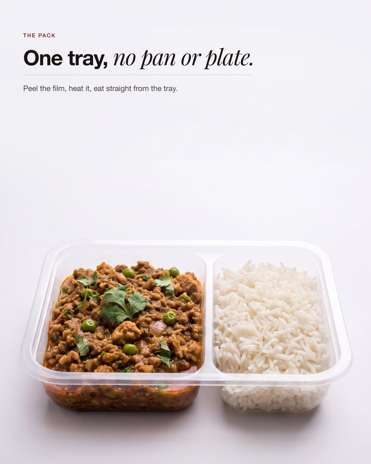 Chicken Keema Breakfast Bowl, the sealed tray opened flat, chicken keema in one compartment and steamed rice in the other, no pan or plate needed