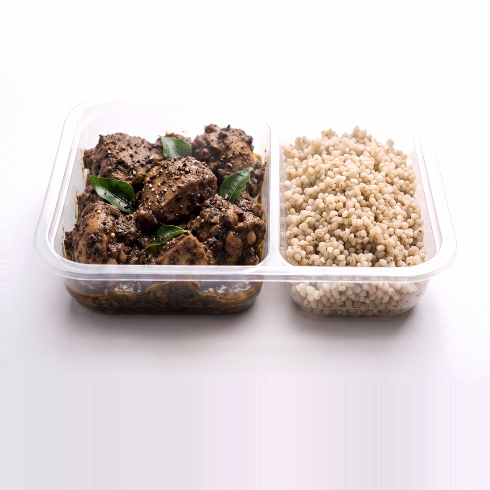 Chettinad Pepper Chicken, the open tray with black pepper masala beside pearl millet