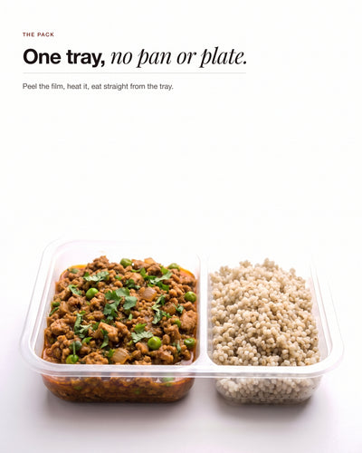 Chicken Keema Breakfast Bowl in its two compartment tray, keema beside pearl millet