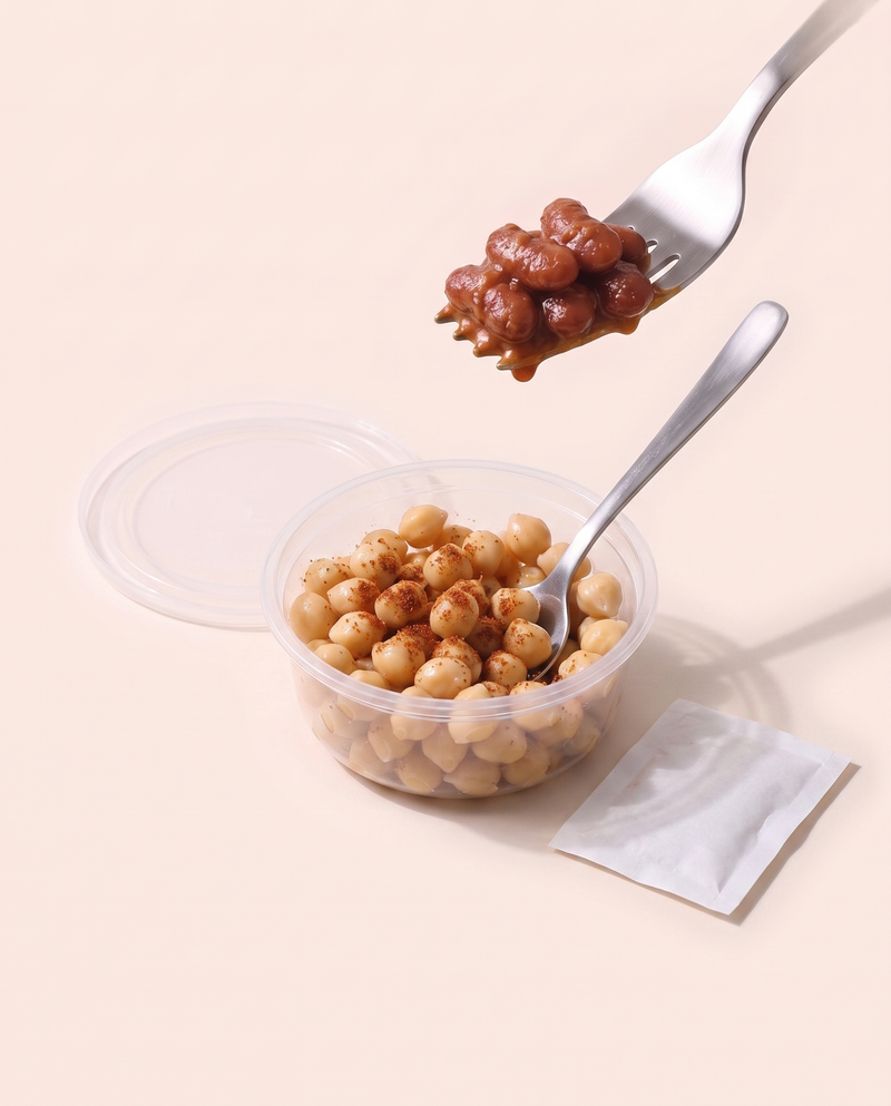 White Channa High Protein Top-up, steamed chickpeas in their tub with the dry masala sachet