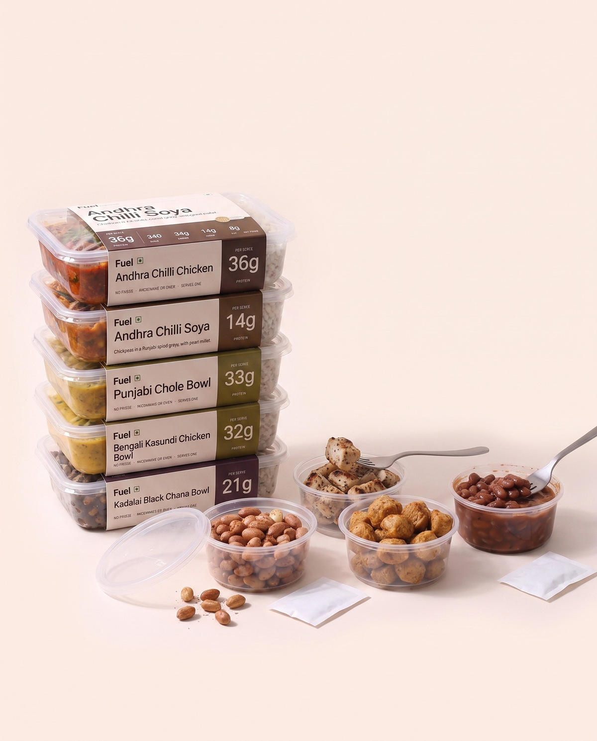 The Full Stack, five Fuel boxes in their printed sleeves with protein top-up tubs in front